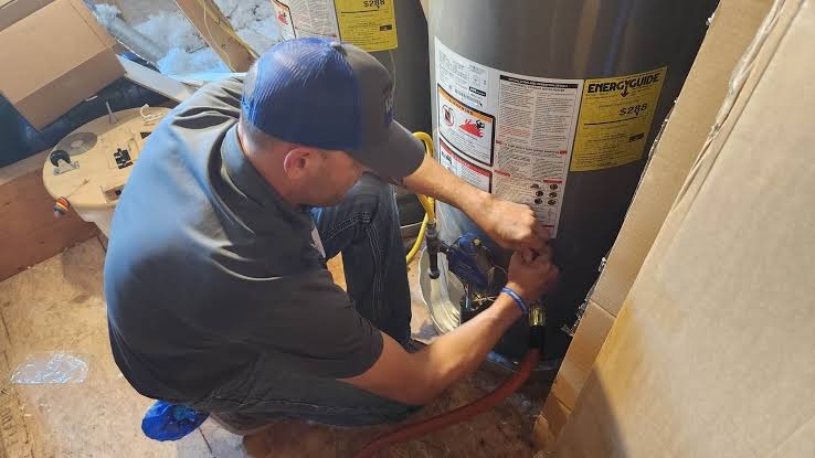 Licensed Plumber Servicing and Repairing Water Heater in Punta Gorda FL